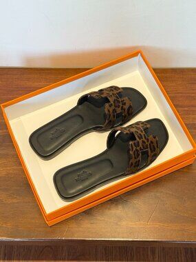 Hermès leopard print sandals